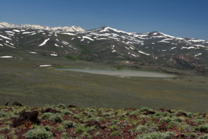 Scenic view of Beauty Peak West Pond with Sierra Nevada in the distance