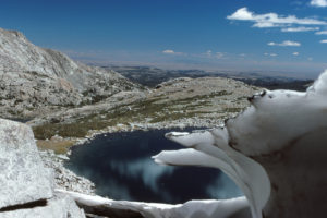 Scenic view of Bivouac Lake 1986-09-03, #0823, with snowbank; has fairy shrimp; Lander Ranger District, Shoshone National Forest, Popo Agie Wilderness