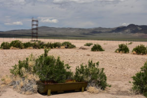 Scenic view of Garfield Flat Stock Tank Pond 2019-05-13, #09, with Garfield Hills in distance; dry; private