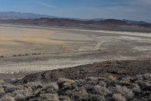 Scenic view of Wildcat Freight Station Pond 2022-02-09, #32, with Bunejug Mountains in distance; lacks fairy shrimp; Nevada Department of Wildlife