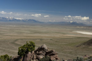 Scenic view of Ruby "Dry Lake Flat" 2018-05-09, #06, with Ruby Mountains and East Humboldt Range in distance; dry; Wells BLM Office