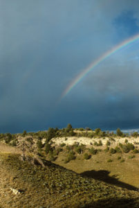 Scenic view of Beaver Rim 1988-07, #0304, with rainbow; Lander BLM Office