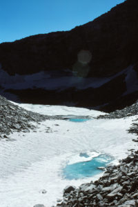 Scenic view of frozen pond above Bivouac Lake 1987-08-12, #3406; lacks fairy shrimp; Lander Ranger District, Shoshone National Forest, Popo Agie Wilderness