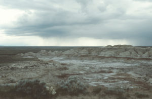 Scenic view of storm and Wind River Basin from near Castle Gardens Storm Pond 1993-06-02, #0406; Lander BLM Office