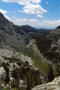 Scenic view of Little Sandy Overlook Pond 1989-08-21, #1127, with view of Little Sandy Creek canyon; has fairy shrimp; Pinedale Ranger District, Bridger-Teton National Forest, Bridger Wilderness