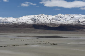 Scenic view of Winnemucca Mud Flat Pond #1 2023-04-05, #05, with Tohakum Peak in distance; lacks fairy shrimp; Humboldt BLM Office