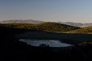 Scenic view of Bald Mountain Rabbitbrush Flat Pond 2023-07-13 #26, with Wassuk Range in distance, has fairy shrimp; Bridgeport Ranger District, Humboldt-Toiyabe National Forest, Wovoka Wilderness