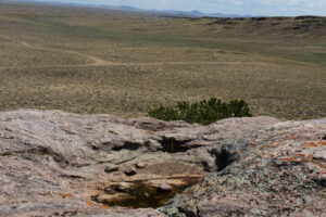 Scenic view of Dead Ant Rock Pool 2025-08-17, #4, looking southeast; dry; Lander BLM Office