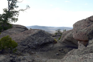 Scenic view of West Tin Cup Summit Rock Pool 2025-08-17, #10, with Long Creek Mountain in background; dry; Lander BLM Office